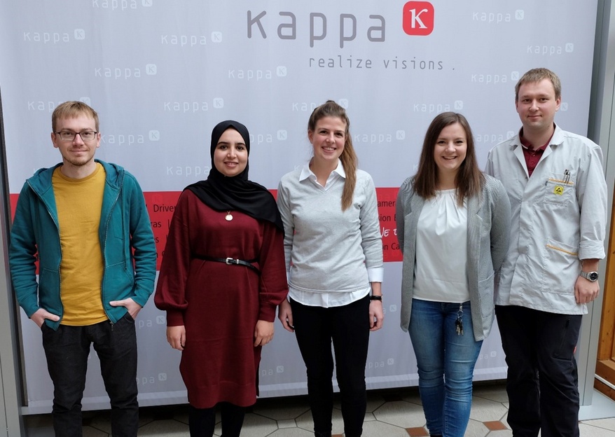 Group photo, from left: Paul Staab (VV), Hasnae Ba-Ouali and Judith Zimmerer (Kappa’s Deutschlandstipendium awardees 2022/23), Katrischa Zarins (HR) and Jonas Herwig (Production)
